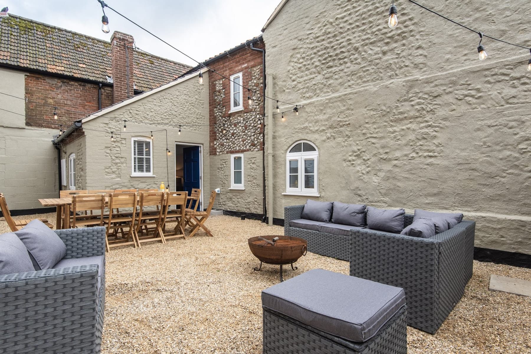 Outdoor sofas in the courtyard at South Creek Retreat