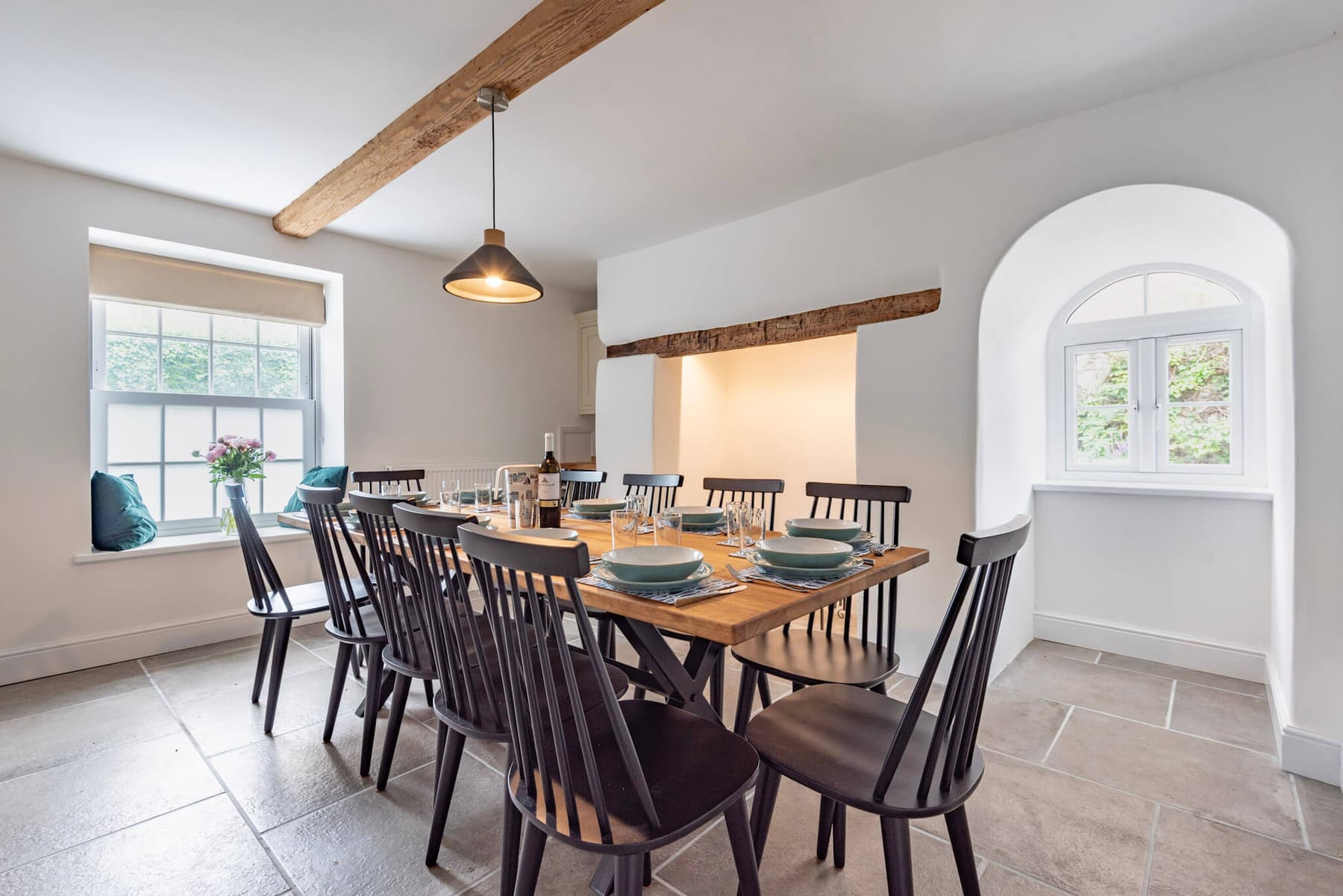 The dining room at South Creek Retreat laid for fourteen