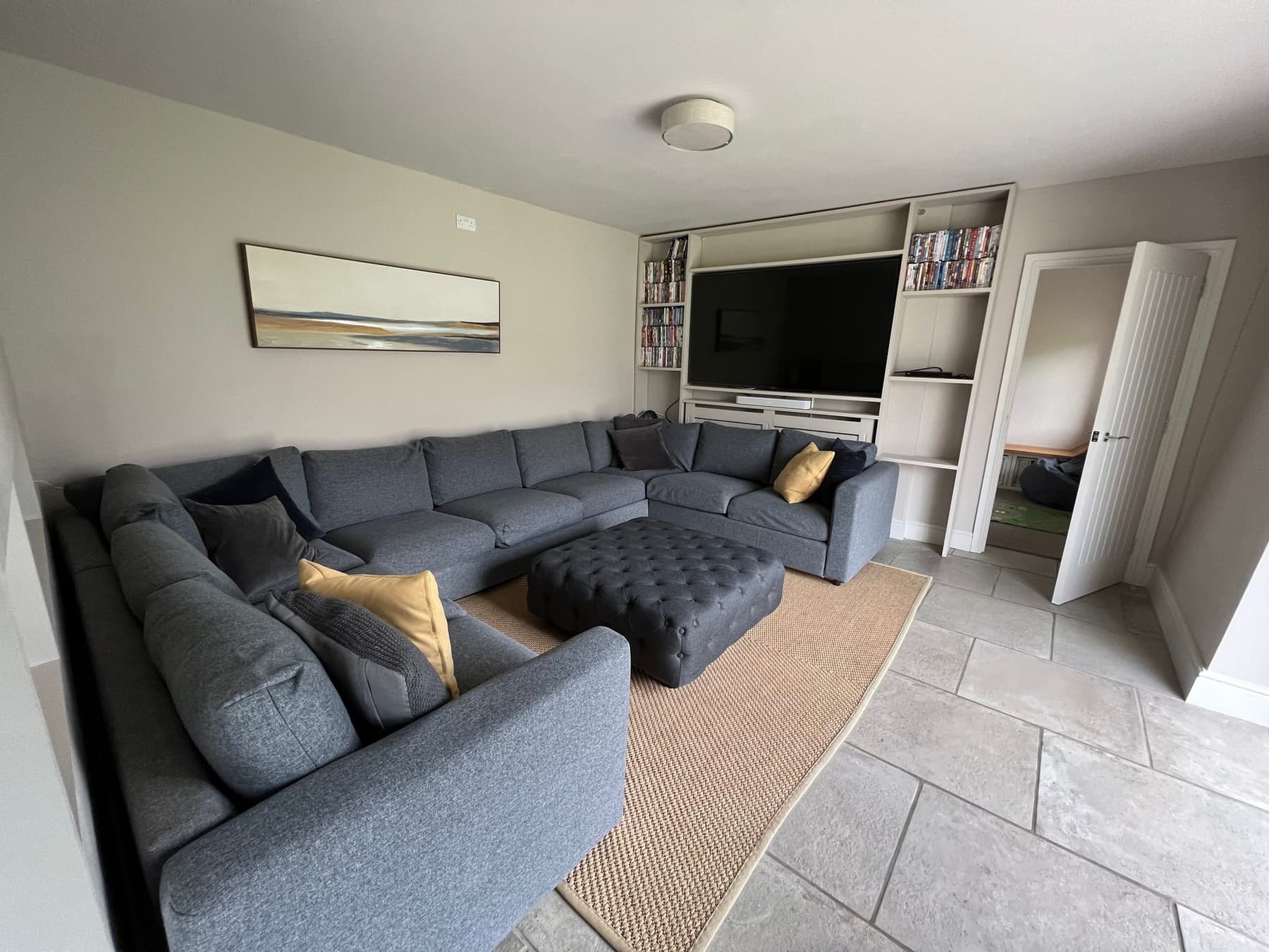The cinema room at South Creek Retreat, with corner seating for everyone