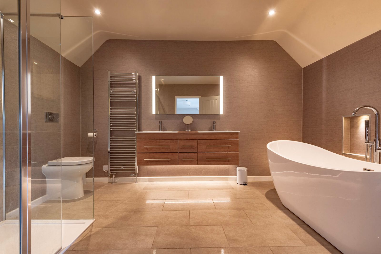 The Holkham ensuite, with its freestanding bath, walk-in shower and double basin